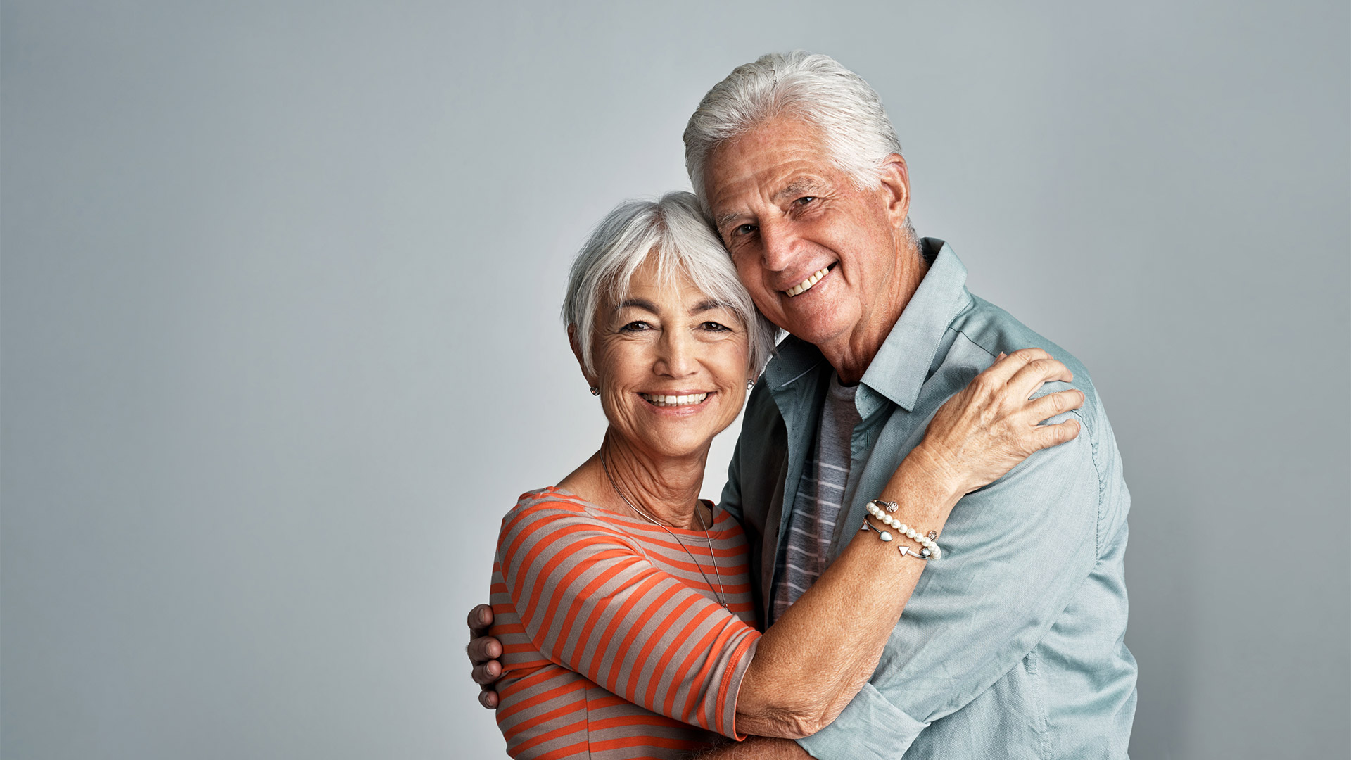 Older couple embracing